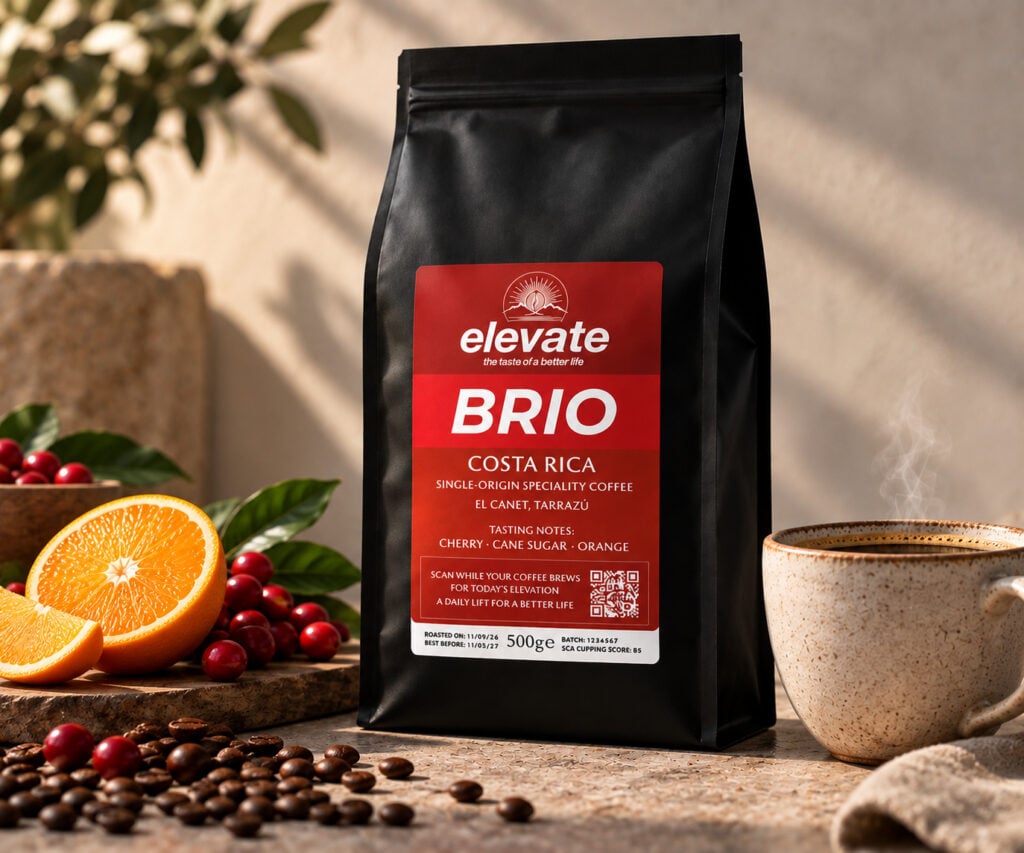 Elevate BRIO Costa Rica specialty coffee with cherry, cane sugar and orange tasting notes beside a freshly brewed coffee.
