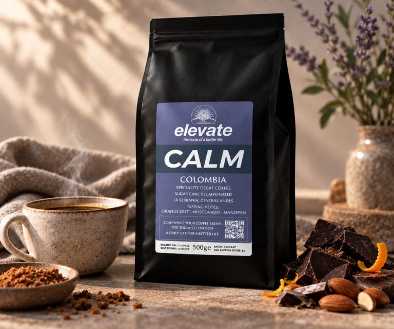 Elevate CALM Colombian decaf specialty coffee with orange zest, muscovado and marzipan tasting notes beside a freshly brewed coffee.